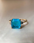 Anillo Solitario Topacio Swiss Blue Oro 18K