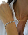 Collar cadena con cinco circones en bisel de Plata 925 bañado en oro
