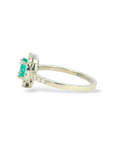 Anillo Solitario Esmeralda Oval 0,48 ct Halo de brillantes