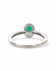 Anillo Solitario Esmeralda 0,50 ct halo diamantes oro 18K