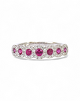 Anillo Cintillo Rubies en Halo de Brillantes
