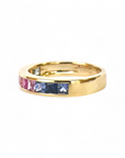 Anillo Cintillo Zafiros colores Oro 18K