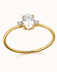 Anillo Topacio Blanco Oval y Diamante Lateral