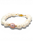Pulsera Perlas naturales de 10 x 8 mm con perla rosada central