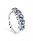Anillo quintillo de Zafiros con halo de brillantes