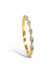 Anillo cintillo ojitos diamantes en grifa 0,17 ct oro 10K