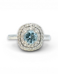 Anillo solitario aguamarina redonda doble halo diamantes oro blanco 18K