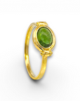 Anillo solitario turmalina verde oval en bisel oro 18K