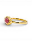 Anillo solitario turmalina roja oval en bisel oro 18K