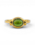 Anillo solitario turmalina verde oval en bisel oro 18K