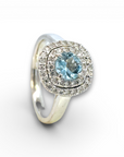 Anillo solitario aguamarina redonda doble halo diamantes oro blanco 18K