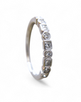 Anillo Cintillo Brillantes y princess Oro 14K