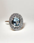 A pedido - Anillo Aguamarina Oval en Bisel 7x5 mm Halo