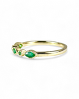 Anillo Cintillo Esmeralda ojitos y círculos en bisel de oro 10K