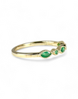 Anillo Cintillo Esmeralda ojitos y círculos en bisel de oro 10K