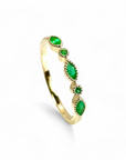Anillo Cintillo Esmeralda ojitos y círculos en bisel de oro 10K