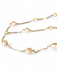 Collar cadena con perlas de distintos tamaños y cadena de 10cm