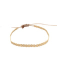 Pulsera ajustable ClaraJoyas de hilo con mostacillas planas de plata bañadas en oro