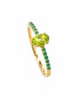 Anillo Solitario Peridoto Oval y turmalinas redondas en argolla