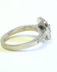 A pedido - Anillo Zafiro Redondo en Grifa 0,60 ct Halo