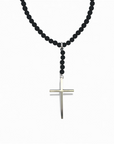 Collar de Cuentas Negras con Cruz en Acero