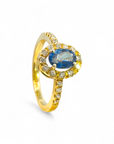 Anillo Solitario Zafiro Oval Halo de brillantes en oro 18K