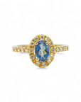 Anillo Solitario Zafiro Oval Halo de brillantes en oro 18K