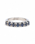 Anillo cintillo de zafiros en grifa oro blanco 18K