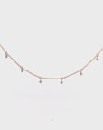 Collar oro rosado con diamantes en grifa