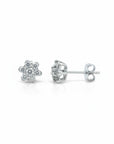 Sophia Schneider Joyas white gold 10K flower stud earrings with 7 brilliant-cut diamonds, 6mm.