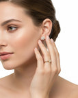 Sophia Schneider Joyas 10K gold stud earrings with 0.25 ct diamonds in a floral cluster design, 8x8mm.