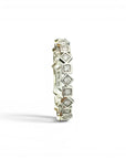 Sophia Schneider Joyas geometric 10K gold band with bezel-set diamonds, 0.10 ct total weight.