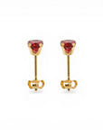 Sophia Schneider Joyas 10K gold stud earrings with 4mm red garnet gemstones set in a prong setting.