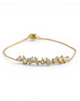 Sophia Schneider Joyas 14K gold bracelet with mixed-cut diamonds in various shapes and sizes, adjustable length.