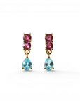 Sophia Schneider Joyas 14K gold drop earrings with two pink rhodolite stones and a pear-cut blue topaz.