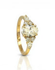 Sophia Schneider Joyas 18K yellow gold ring with 1.08 ct oval lab-created diamond and accent navette diamonds.