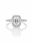 Sophia Schneider Joyas 18K white gold ring with 1.09 ct emerald-cut lab diamond halo and pavé band.