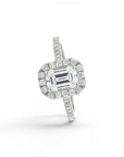 Sophia Schneider Joyas 18K white gold ring with 1.09 ct emerald-cut lab diamond surrounded by a halo and pavé band.