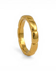 Sophia Schneider Joyas fine band ring in gold-plated sterling silver with a segmented design.