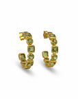 Sophia Schneider Joyas gold-plated silver hoop earrings with bezel-set prehnite stones in various cuts.