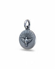 Sophia Schneider Joyas round 12mm Holy Spirit medal in sterling silver, featuring a dove with radiating rays.