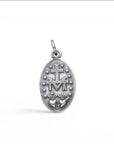 Sophia Schneider Joyas oval 16mm sterling silver medal with Virgin of the Rays and Sacred Heart design.