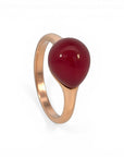 Sophia Schneider Joyas rose gold plated silver ring with a red garnet stone, size 13.