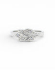 Sophia Schneider Joyas silver ring with carved leaf design and clear cubic zirconia stones.