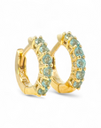 Aros argollas Topacio Azul microgrifa oro 10K