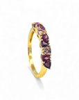 Anillo cintillo amatista, rodholita y granate en grifa oro 10k