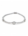Pulsera Tennis Diamantes con tres Diamantes corte esmeralda