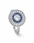 Anillo Solitario Diamante en bisel y doble halo de zafiros y brillantes
