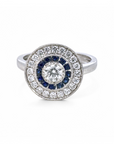 Anillo Solitario Diamante en bisel y doble halo de zafiros y brillantes