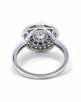 Anillo Solitario Diamante en bisel y doble halo de zafiros y brillantes